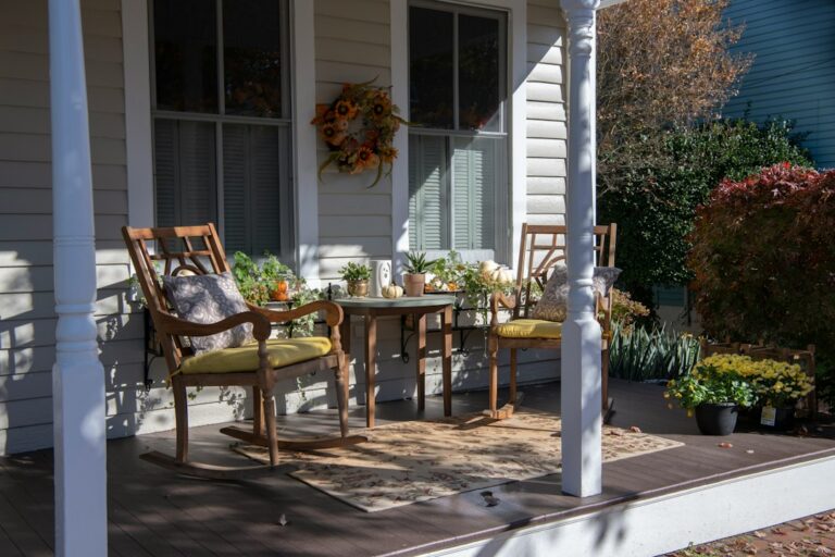 Decorative front porch of an older family home, representing inherited property in probate