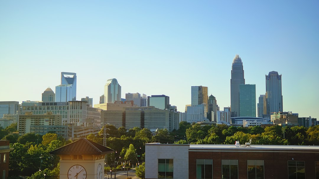 Charlotte skyline and surrounding neighborhoods, where the North Carolina foreclosure process runs through the county clerk