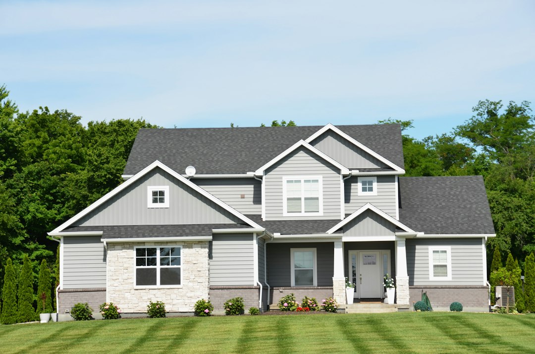 Gray and white single-family country home, the kind of property that can come up in short sale wholesaling