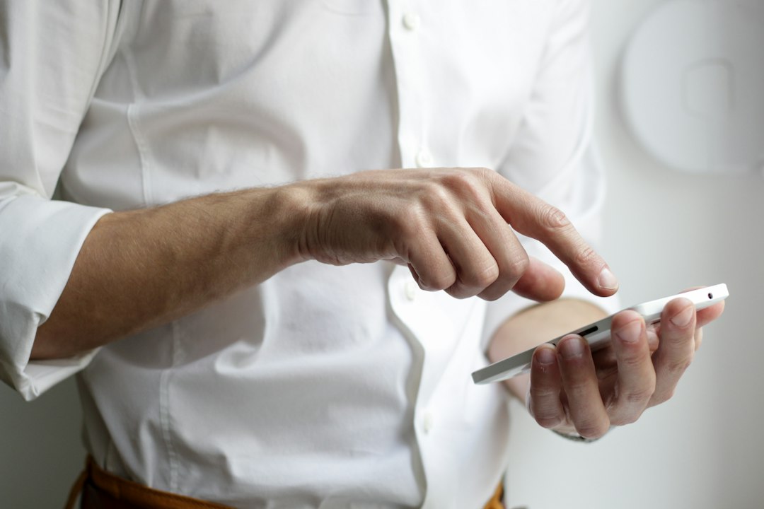 Phone and laptop screens showing page designs for a wholesale real estate website