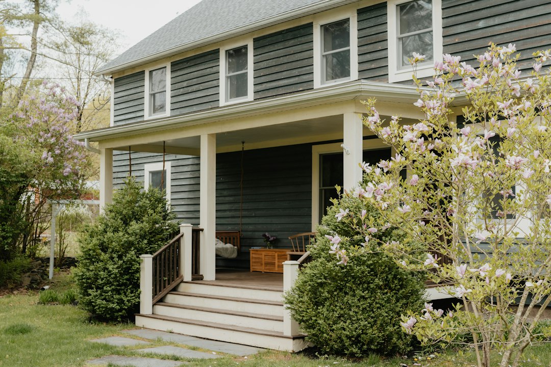Single-family house with a front porch, the kind of rental screened with the 1 percent rule in real estate