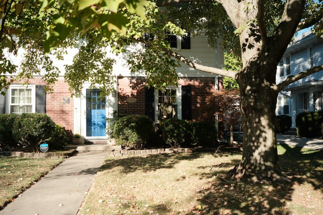 Single-family rental house on a quiet suburban street, illustrating a cash out refinance on an investment property