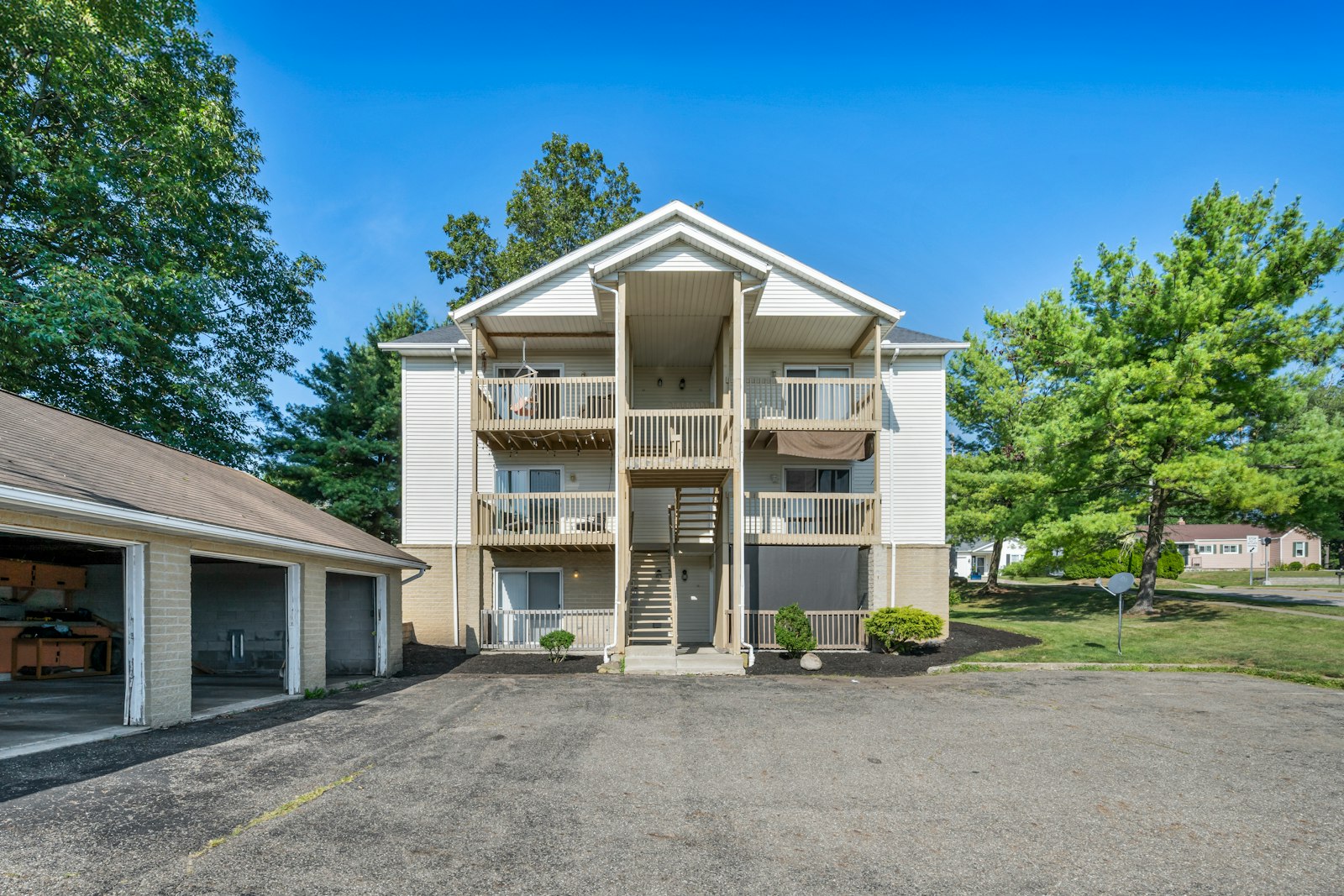 Two-story apartment building with balconies, a typical replacement property under the 1031 exchange rules
